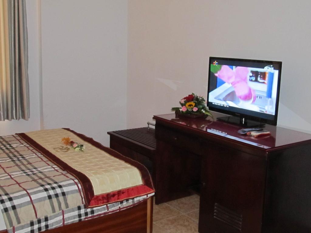 Hotel Khach San Trung Mai Ho Či Minovo Město Pokoj fotografie