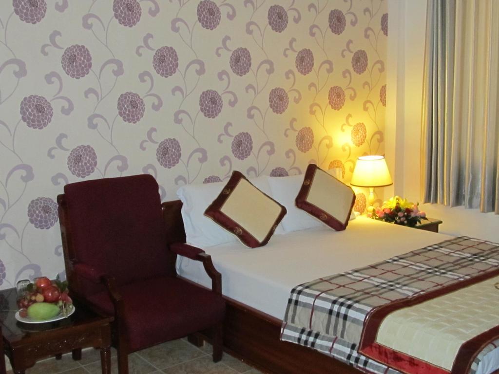 Hotel Khach San Trung Mai Ho Či Minovo Město Pokoj fotografie